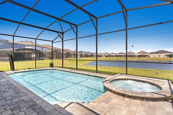 Soul Enhancing Pool area of the home in Kissimmee - Amazing Atmosphere - Completely sunbathed space - Stunning Pool with Hot tub