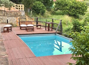 Decked area around pool