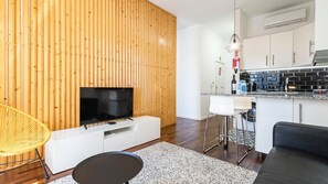 Whether you're sipping coffee by the window or lounging on the sofa, relaxation is guaranteed in our comfortable living area #TV #airbnb