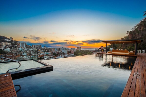 Rooftop pool and jacuzzi with breathtaking views