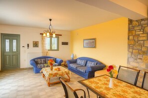 Relax in a tastefully decorated living area with natural light and warm tones.
