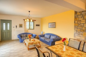 Relax in a tastefully decorated living area with natural light and warm tones.