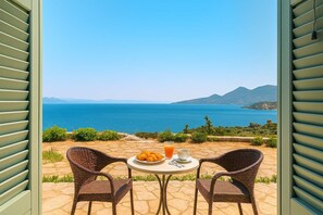 Serene View from the Room
Wake up to peaceful landscapes framed by shuttered windows.