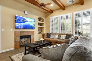  Living room with 65" Samsung Smart TV, Cable TV, Fireplace, recessed lights