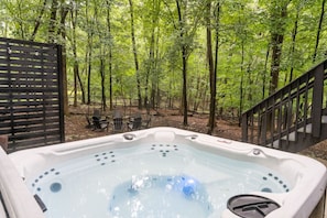 Such a serene setting to soak in the hot tub that seats 6.