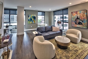 Open Living Room Area with multiple city views