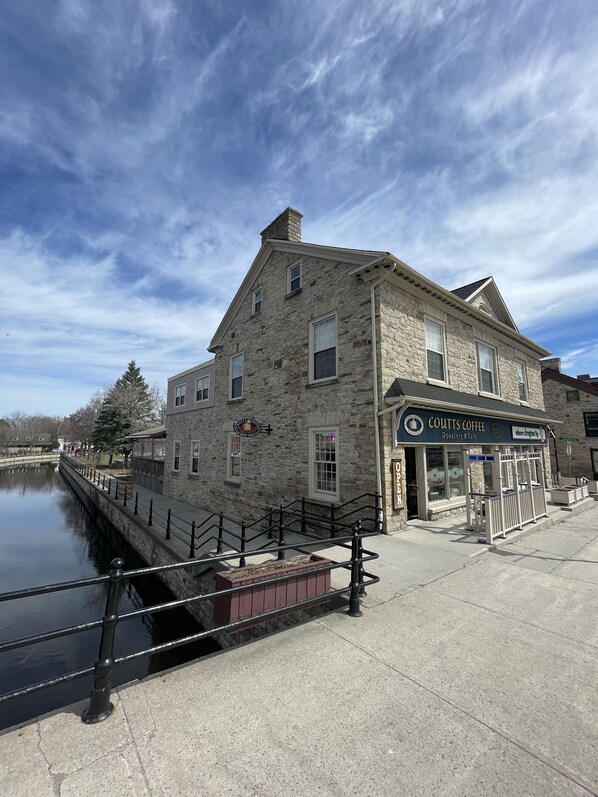 View of the building, cafe, and 3rd floor apartment