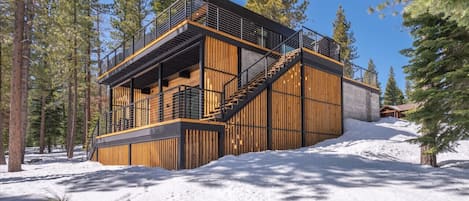 Discover the epitome of eco-living in this new, environmentally friendly home crafted with sustainable materials such as concrete and recycled shipping containers by Honomobo. Equipped with heat pumps, solar panels, and more, it exemplifies modern innovat