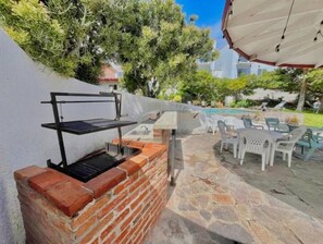 Outdoor Gas & Wood BBQ Grill Area.