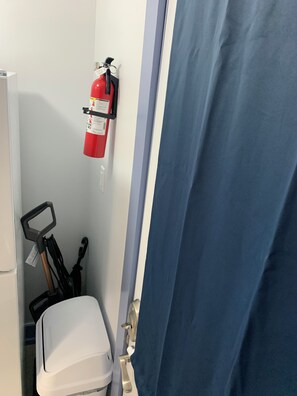 Fire extinguisher, umbrella, Bissell Crosswave Hydrosteam, wastebasket