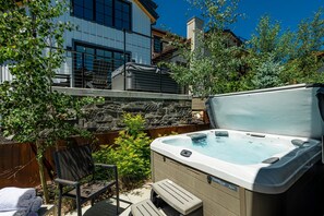 4th level back patio with a private hot tub