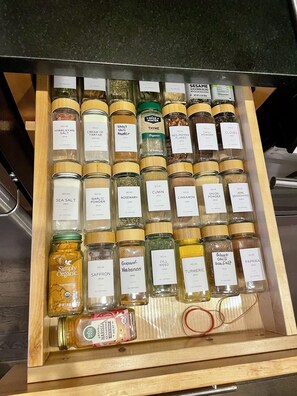 So many spices to choose from in this well-stocked kitchen! 