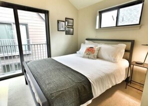 Comfy Queen bed, blackout curtains, desk