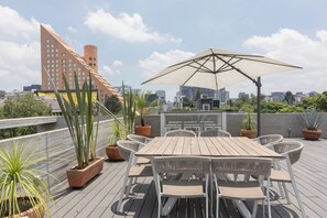 Shared rooftop with expansive city views.


