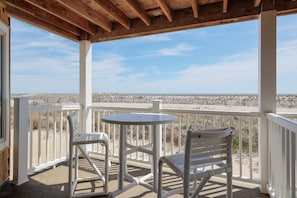 Sip your coffee while feeling the ocean breeze