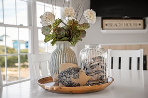 Bringing the beach vibes home with coastal decor.