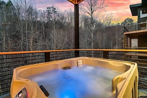 Soak under stunning sunsets with serene forest views and tranquil vibes!