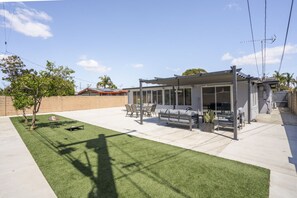 Kick back and relax on our cozy backyard patio! 🌿✨ A perfect space to soak up the fresh air and unwind in comfort.