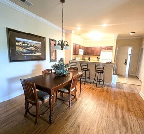 Dining Area: Table, counter, kitchen