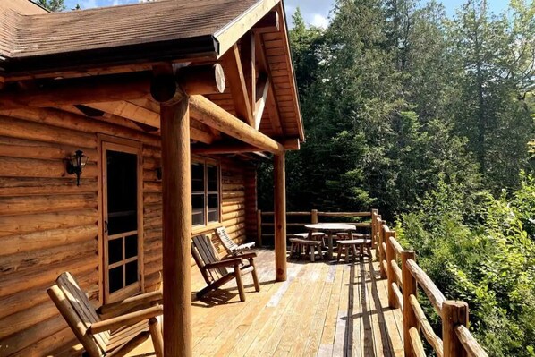 Your deck overlooking Little Tunk Pond, nestled among the Maine woods.