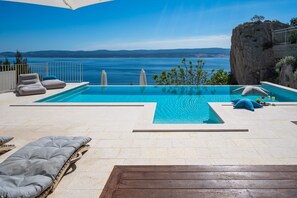 The private and heated pool with a fully automated salt electrolysis system