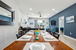 Beautiful table setup for 8 in the dining area; steps away from the living room