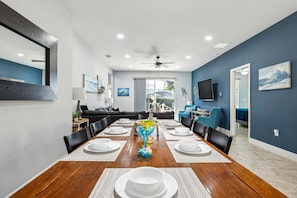 Beautiful table setup for 8 in the dining area; steps away from the living room