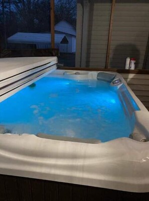 A private screened in Hot Tub in the back of the home awaits.