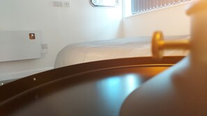 Bedroom with dark shade blinds