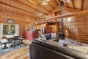 Two Story Log Cabin with Vaulted Ceilings and Fireplace