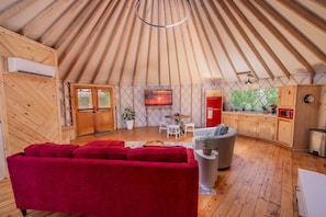 Once you step inside you will be mesmerized by the cozy features of the Yurt!