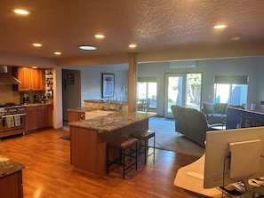 Kitchen looking towards dining area and backyard