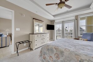 Master bedroom w/ balcony access & TV