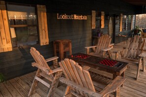 Porch with outdoor seating and games