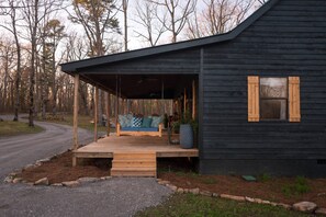 Side of porch with hanging swing
