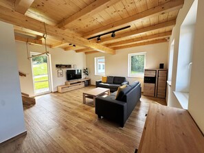 Couch, Property, Wood, Hall, Interior Design, Flooring, Building, Floor, Living Room, Table