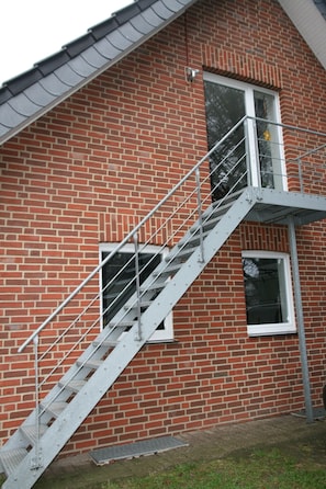 Ferienwohnung Hof Berkhoff, (Haltern am See)-Der Eingang zur Ferienwohnung ist über eine Außentreppe erreichbar.