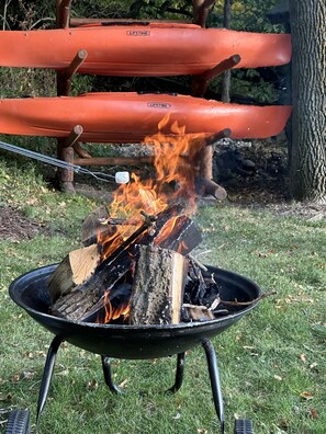 Property features a firepit and 2 kayaks for guest use