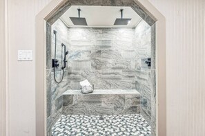 Experience luxury with the stunning double rain shower, designed to provide a spa-like experience. With ample space and modern fixtures, it’s the perfect place to refresh after a busy day of exploring or unwinding in comfort.
