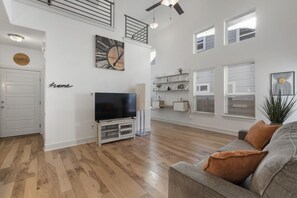 Spacious Living Room w/ 55" Television