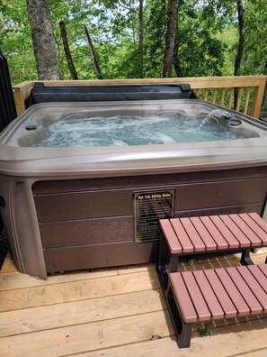 Welcome the season in our new 4 person hot tub surrounded by nature.