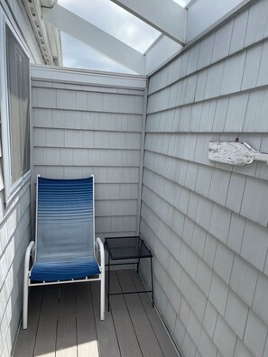Little reading area in the shade by the front door