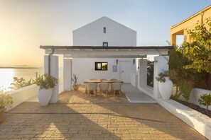 Building's Main Entrance, with outside dining area.