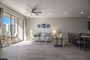 Spacious, air conditioned living space welcomes you home after a full day at the beach