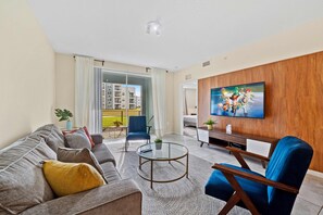 Magnificent Living Area of the Condo in Kissimmee Florida - Access to balcony - Stylish furniture arrangement providing comfort and a cohesive look - Smart TV and  Netflix - Comfy Sofas