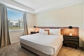 Phenomenal Bedroom of the Condo in Kissimmee Florida - Cozy king size bed and a private bathroom - Spacious bedroom offering comfort and style - Outstanding outside views from the large window