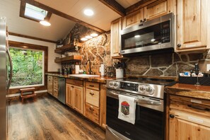 Long Galley Kitchen with Rock
