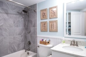 Bathroom off the hallway.  Tub and shower. 