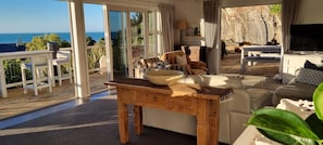 Spectacular sea views. Drinks & nibbles on the front deck or a BBQ on the side.