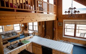 The main level also features the spacious living area and a view of the loft.